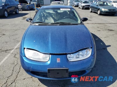 Piąte zdjęcie samochodu w środku: 2001 SATURN SC1 VIN:1G8ZP128X1Z207319 - miniatura