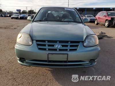 Piąte zdjęcie samochodu w środku: 2004 HYUNDAI ACCENT GL VIN:KMHCG35C14U308396 - miniatura