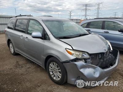 Czwarte zdjęcie samochodu z boku: 2015 TOYOTA SIENNA XLE VIN:5TDYK3DC8FS654334 - miniatura