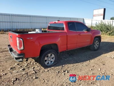 Trzecie zdjęcie samochodu z tyłu: 2015 GMC CANYON SLE VIN:1GTH6BEA5F1156309 - miniatura
