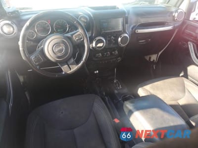 Zdjęcie 8 z 12 samochodu: 2016 JEEP WRANGLER UNLIMITED SAHARA VIN:1C4BJWEG2GL304390 - miniatura