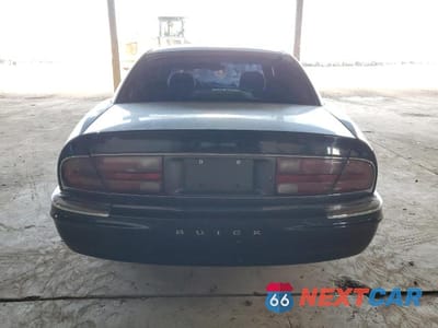 Zdjęcie 6 z 13 samochodu: 2001 BUICK PARK AVENUE VIN:1G4CW54K614278007 - miniatura