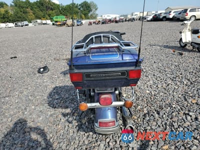 Czwarte zdjęcie samochodu z boku: 2009 HARLEY-DAVIDSON FLHTCU VIN:1HD1FC4169Y628861 - miniatura