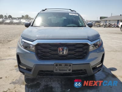 Piąte zdjęcie samochodu w środku: 2023 HONDA PASSPORT EXL VIN:5FNYF8H56PB021768 - miniatura