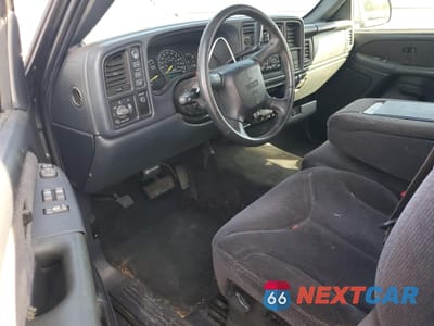 Zdjęcie 8 z 14 samochodu: 1999 GMC NEW SIERRA K1500 VIN:1GTEK19T8XZ535635 - miniatura