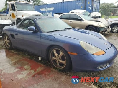 Czwarte zdjęcie samochodu z boku: 1997 PORSCHE BOXSTER VIN:WP0ZZZ98ZVS604891 - miniatura