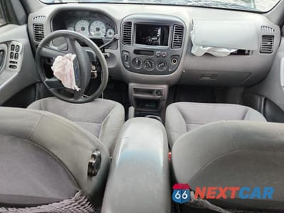 Zdjęcie 8 z 14 samochodu: 2002 FORD ESCAPE XLT VIN:1FMYU04102KB56858 - miniatura