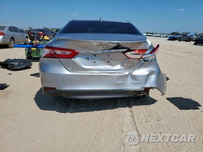 Zdjęcie 6 z 14 samochodu: 2019 TOYOTA CAMRY L VIN:4T1B11HK6KU199967 - miniatura