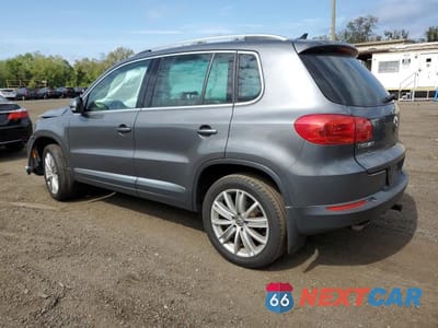 Drugie zdjęcie samochodu z przodu: 2014 VOLKSWAGEN TIGUAN S VIN:WVGBV3AX3EW594879 - miniatura
