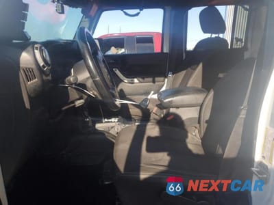 Zdjęcie 7 z 12 samochodu: 2016 JEEP WRANGLER UNLIMITED SAHARA VIN:1C4BJWEG2GL304390 - miniatura