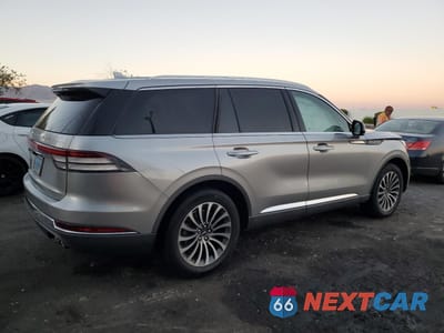Trzecie zdjęcie samochodu z tyłu: 2020 LINCOLN AVIATOR RESERVE VIN:5LM5J7XC2LGL36278 - miniatura