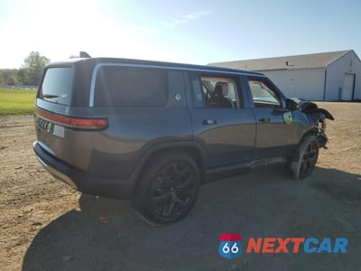 Trzecie zdjęcie samochodu z tyłu: 2025 RIVIAN R1S ADVENTURE VIN:7PDSGBBA9SN072092 - miniatura