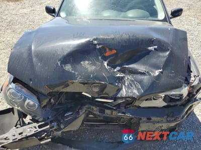 Zdjęcie 11 z 14 samochodu: 2006 BMW 750 I VIN:WBAHL83506DT07215 - miniatura