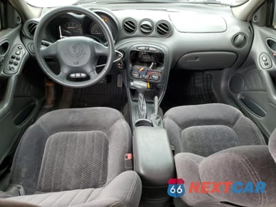 Zdjęcie 8 z 13 samochodu: 2000 PONTIAC GRAND AM GT VIN:1G2NW52E5YC550660 - miniatura