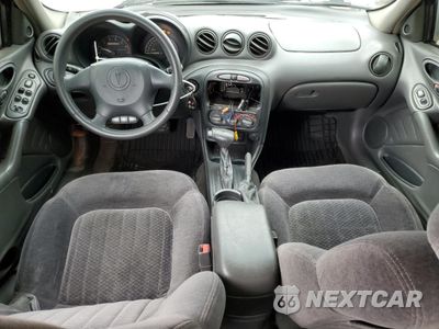 Zdjęcie 8 z 13 samochodu: 2000 PONTIAC GRAND AM GT VIN:1G2NW52E5YC550660 - miniatura