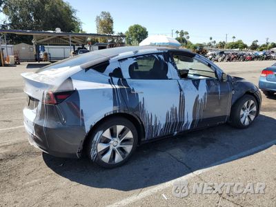 Trzecie zdjęcie samochodu z tyłu: 2023 TESLA MODEL Y VIN:7SAYGAEE5PF812336 - miniatura