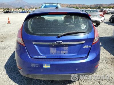Zdjęcie 6 z 12 samochodu: 2014 FORD FIESTA TITANIUM VIN:3FADP4FJ6EM204185 - miniatura