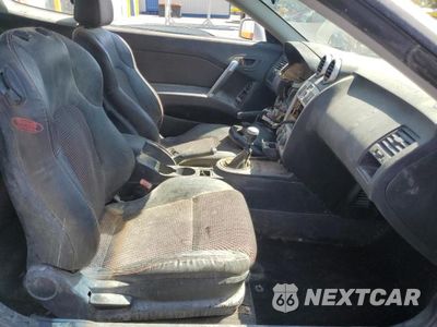 Zdjęcie 10 z 12 samochodu: 2005 HYUNDAI TIBURON VIN:KMHHN65F25U168299 - miniatura