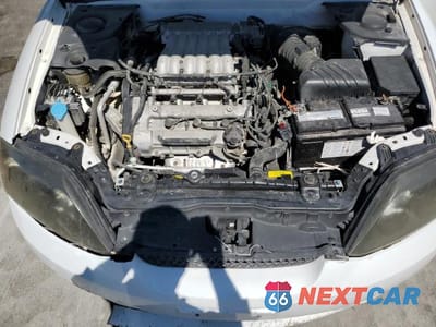 Zdjęcie 11 z 12 samochodu: 2005 HYUNDAI TIBURON VIN:KMHHN65F25U168299 - miniatura