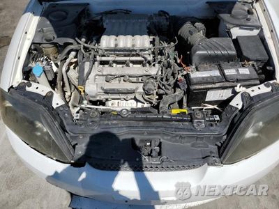 Zdjęcie 11 z 12 samochodu: 2005 HYUNDAI TIBURON VIN:KMHHN65F25U168299 - miniatura