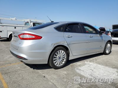 Trzecie zdjęcie samochodu z tyłu: 2016 FORD FUSION SE PHEV VIN:3FA6P0PU1GR195301 - miniatura