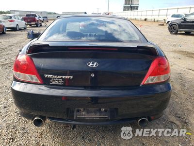 Zdjęcie 6 z 14 samochodu: 2005 HYUNDAI TIBURON VIN:KMHHM65D65U178514 - miniatura