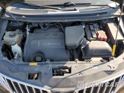 Zdjęcie 12 z 13 samochodu: 2015 LINCOLN MKX VIN:2LMDJ8JK8FBL28612 - miniatura