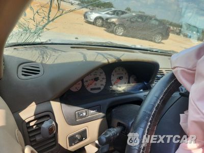 Zdjęcie 9 z 12 samochodu: 1999 NISSAN MAXIMA GLE VIN:JN1CA21A0XT707916 - miniatura