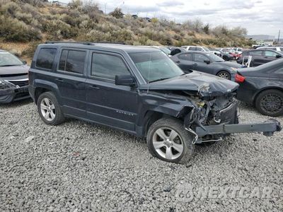 Czwarte zdjęcie samochodu z boku: 2014 JEEP PATRIOT LATITUDE VIN:1C4NJRFB9ED718453 - miniatura