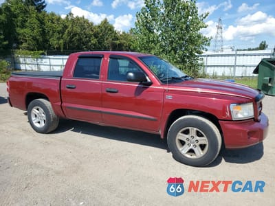 Czwarte zdjęcie samochodu z boku: 2011 DODGE DAKOTA SLT VIN:1D7RE3GPXBS553328 - miniatura