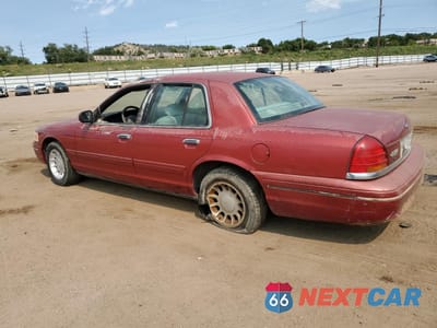 Drugie zdjęcie samochodu z przodu: 2000 FORD CROWN VICTORIA LX VIN:2FAFP74W4YX100974 - miniatura