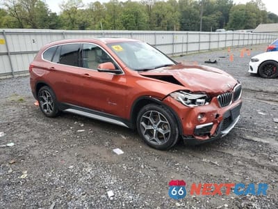Czwarte zdjęcie samochodu z boku: 2018 BMW X1 XDRIVE28I VIN:WBXHT3C32J5F89578 - miniatura