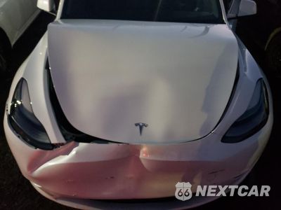 Zdjęcie 11 z 12 samochodu: 2023 TESLA MODEL Y VIN:7SAYGDEE9PF688489 - miniatura