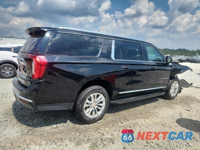 Trzecie zdjęcie samochodu z tyłu: 2021 GMC YUKON XL C1500 SLT VIN:1GKS1GKDXMR250673 - miniatura