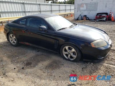 Czwarte zdjęcie samochodu z boku: 2005 HYUNDAI TIBURON VIN:KMHHM65D65U178514 - miniatura