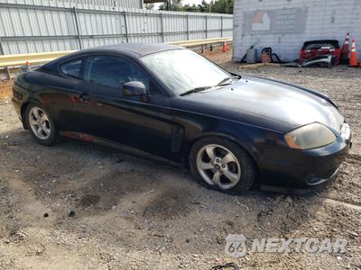 Czwarte zdjęcie samochodu z boku: 2005 HYUNDAI TIBURON VIN:KMHHM65D65U178514 - miniatura
