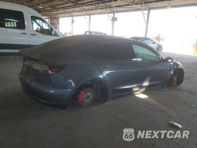 Trzecie zdjęcie samochodu z tyłu: 2021 TESLA MODEL 3 VIN:5YJ3E1EC1MF015704 - miniatura