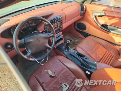 Zdjęcie 7 z 12 samochodu: 1999 PORSCHE BOXSTER VIN:WP0CA2984XU622120 - miniatura