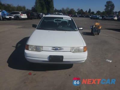 Piąte zdjęcie samochodu w środku: 1996 FORD ESCORT LX VIN:3FASP13J6TR107918 - miniatura