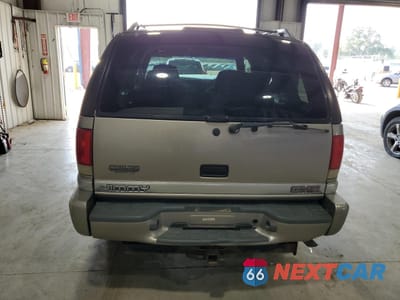 Zdjęcie 6 z 15 samochodu: 1999 GMC JIMMY VIN:1GKDT13W6X2514954 - miniatura