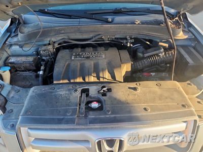 Zdjęcie 12 z 13 samochodu: 2006 HONDA PILOT EX VIN:5FNYF28506B004038 - miniatura