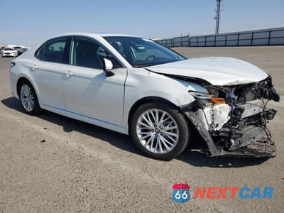 Czwarte zdjęcie samochodu z boku: 2019 TOYOTA CAMRY HYBRID VIN:4T1B21HK3KU511496 - miniatura