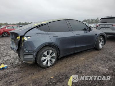 Trzecie zdjęcie samochodu z tyłu: 2023 TESLA MODEL Y VIN:7SAYGDEE3PF605171 - miniatura