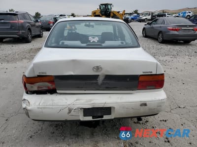Zdjęcie 6 z 14 samochodu: 1994 TOYOTA COROLLA LE VIN:1NXAE09B7RZ196711 - miniatura