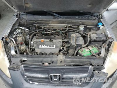 Zdjęcie 12 z 13 samochodu: 2002 HONDA CR-V EX VIN:JHLRD78842C090482 - miniatura