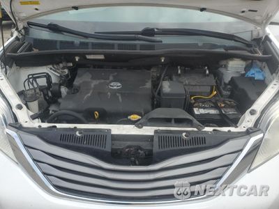Zdjęcie 12 z 13 samochodu: 2013 TOYOTA SIENNA XLE VIN:5TDYK3DC3DS373250 - miniatura
