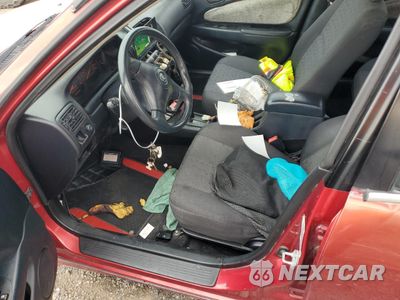 Zdjęcie 7 z 12 samochodu: 2001 TOYOTA COROLLA CE VIN:1NXBR12EX1Z453271 - miniatura