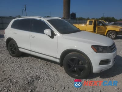 Czwarte zdjęcie samochodu z boku: 2013 VOLKSWAGEN TOUAREG V6 VIN:WVGEF9BP5DD001674 - miniatura