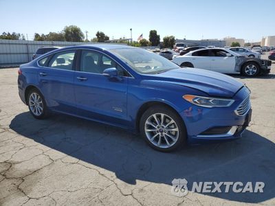 Czwarte zdjęcie samochodu z boku: 2018 FORD FUSION SE PHEV VIN:3FA6P0PU7JR111389 - miniatura