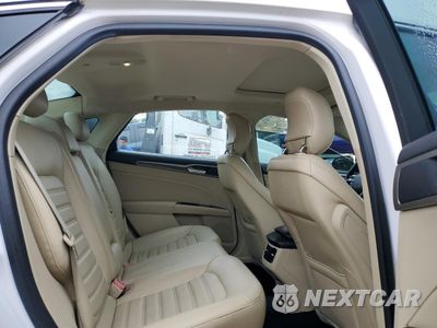 Zdjęcie 10 z 12 samochodu: 2013 FORD FUSION SE HYBRID VIN:3FA6P0LU8DR265863 - miniatura